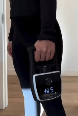 Person with digital kettlebell