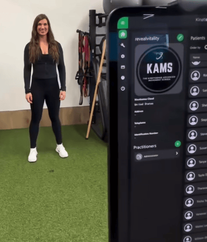 Woman on turf with tablet