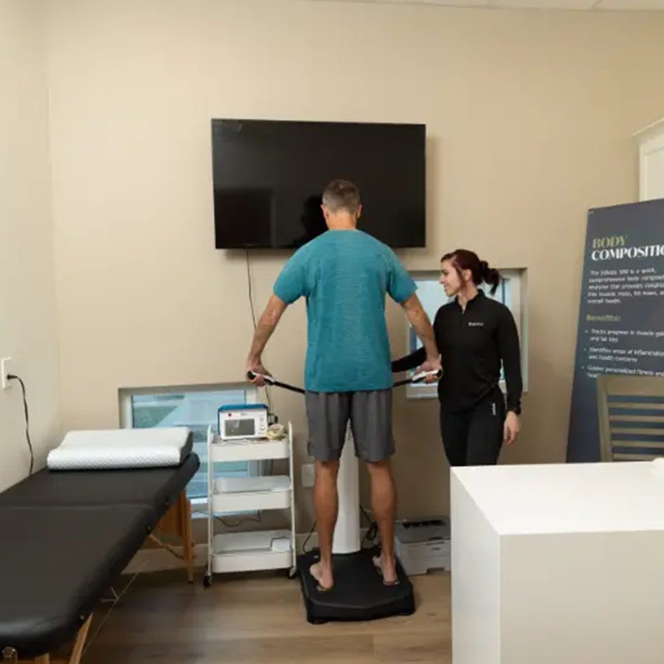 Person on body composition scale